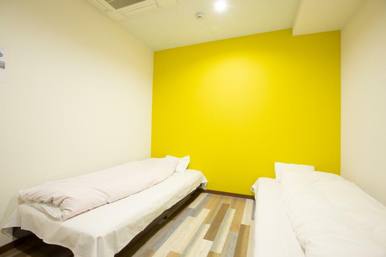 123 Guesthouse Osaka Esterno foto