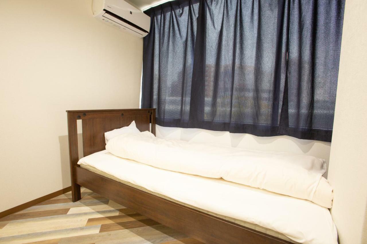 123 Guesthouse Osaka Esterno foto